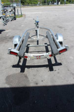 New Triton jet ski trailer, torsion axle, all aluminum, LED lights,