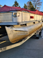 Pontoon boat,motor and trailer