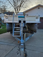 Pontoon boat,motor and trailer