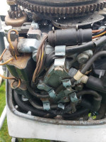 9.9 HP with 15 Carburetor Evinrude Long Shaft Electric Start Tiller