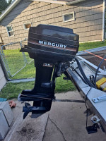 Tracker & 35hp Mercury $2,200 Firm