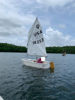 McLaughlin Optimist (Opti) Sailboat with aluminum dolly.