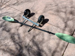 Kayak, with dolly and paddle