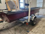 Nice 14.5ft Fiberglass Skiff, Good 2003 25hp Nissan motor, and trailer
