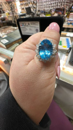 GLA certified 14k blue topaz/diamond ring