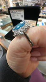 GLA certified 14k blue topaz/diamond ring