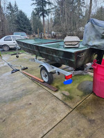12 ft Lund flat bottom boat with 2019 trailer and 4 horse outboard