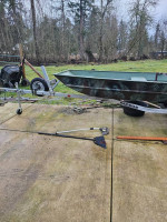 12 ft Lund flat bottom boat with 2019 trailer and 4 horse outboard