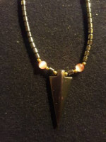 Hematite necklace with decorative arrowhead