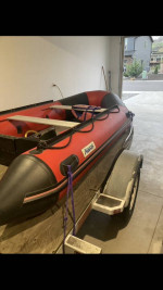 12’ zodiac Honda 15 & trailer