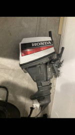 12’ zodiac Honda 15 & trailer