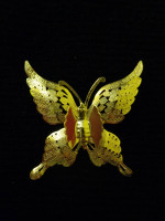 Gold tone butterfly pin