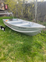 10 foot Gamefisher aluminum boat with truck rack