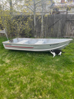 10 foot Gamefisher aluminum boat with truck rack