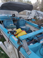 63 little boat runs good it's a 15-footer boat is tagged or so is the trailer