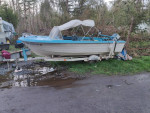 63 little boat runs good it's a 15-footer boat is tagged or so is the trailer