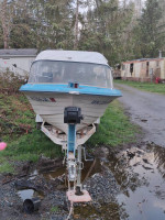 63 little boat runs good it's a 15-footer boat is tagged or so is the trailer