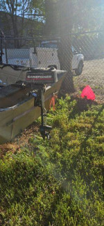 12 foot camo boat with 3 hp motor