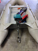 10.6 ft quick silver inflatable with motor
