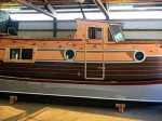New trailerable wooden houseboat