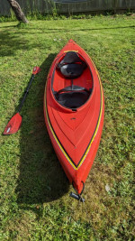 Red two-person kayak