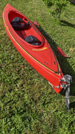 Red two-person kayak
