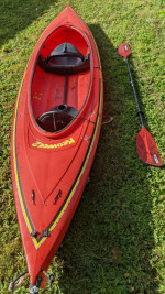 Red two-person kayak