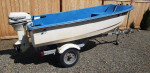 Livingston Boat with 9.9 hp engine and trailer