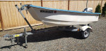 Livingston Boat with 9.9 hp engine and trailer