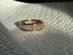 14k gold ring with 16 baguette cut diamonds