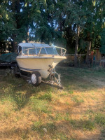 19’2”. 1976 Glassply 165 Mercruiser comes with 2 trailers