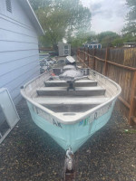 14 foot aluminum boat with Nissan 25hp electric start