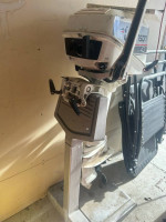 1986 johnson 4.0 boat motor and stand