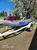 Inflatable Boat withe Motor and Trailer