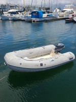 9ft Caribe RIB w 4hp 4 Stroke
