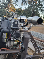 1754 Tracker Grizzly with Mud Buddy Motor