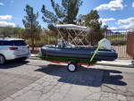 2023 Saturn 14' Triton 25hp Suzuki.