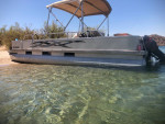 Sun tracker party barge