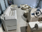 Sun tracker party barge
