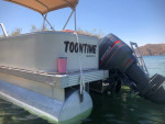 Sun tracker party barge