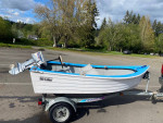 10” Hi-Laker fiberglass boat on an ez-loader galvanized trailer