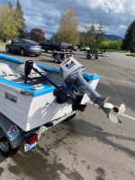 10” Hi-Laker fiberglass boat on an ez-loader galvanized trailer
