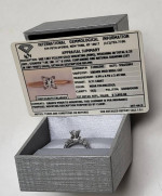 DIAMOND ENGAGEMENT RING IN PLATINUM SETTING W/SIDE BAGUETTES