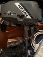 Zodiac and motor by West Marine