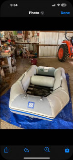 Zodiac and motor by West Marine