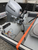 12' Aluminum boat and motor.