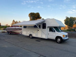 2005 Dutchman 24’ with 12’ slide 43k Miles and 1984 23’ Wellcraft