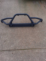 A Jeep bumper guard and winch holder