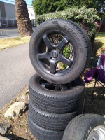SET OF 4, 5 x 120 BOLT PATTERN BLACK RIMS 17 " TIRES