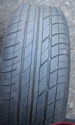 Tire (Newer) on Bent Aluminum Rim (225/60R16)